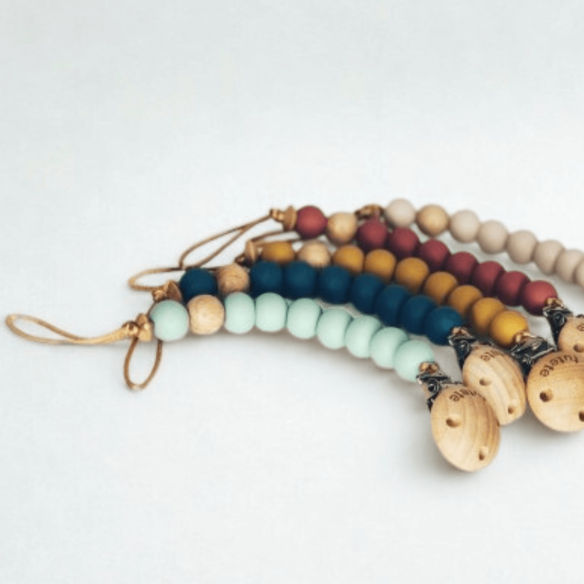 Sujeta chupetes rosa silicona