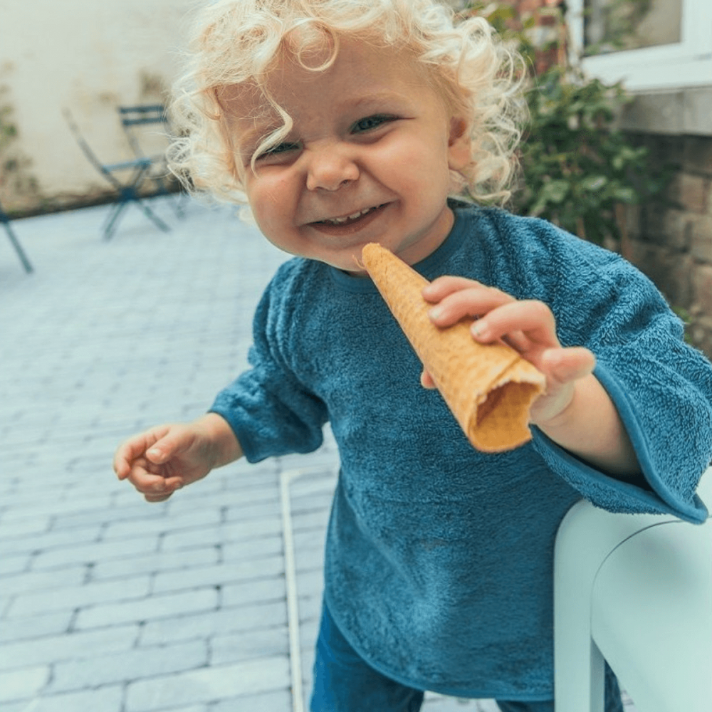 babero manga larga azul timboo babero manga larga azul timboo