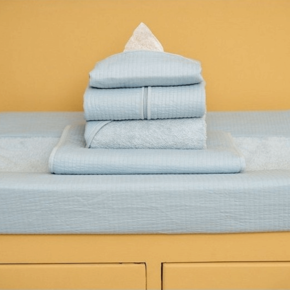 funda para cubrir el cambiador de bebé azul de tela